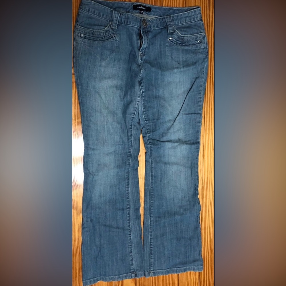 Women’s  jeans boot cut stretchy fly zipper four pockets. Blue size 10